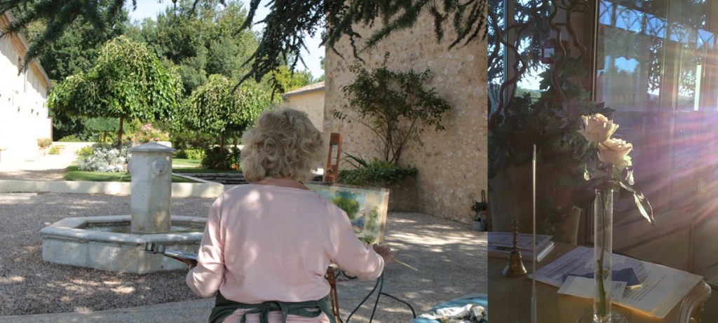 painter over the shoulder courtyard french chateau with roses