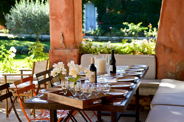 table laid dinner provenceal fresco outside sunny
