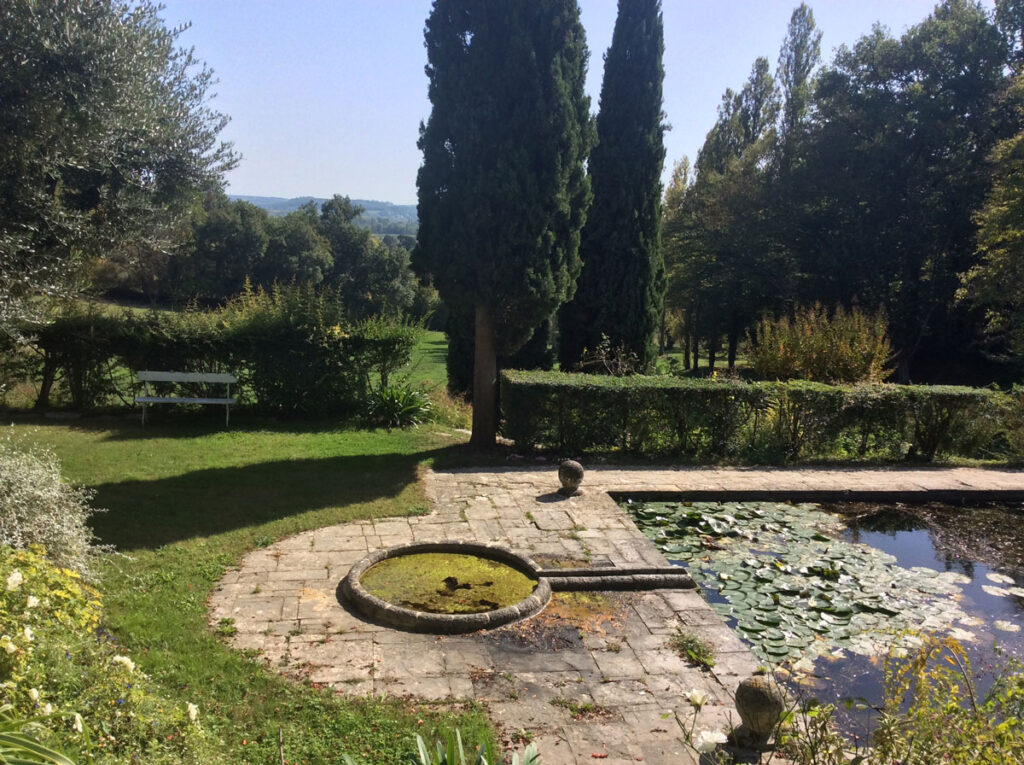 Italian pool,dordogne, garden,waterlilies, cypruses